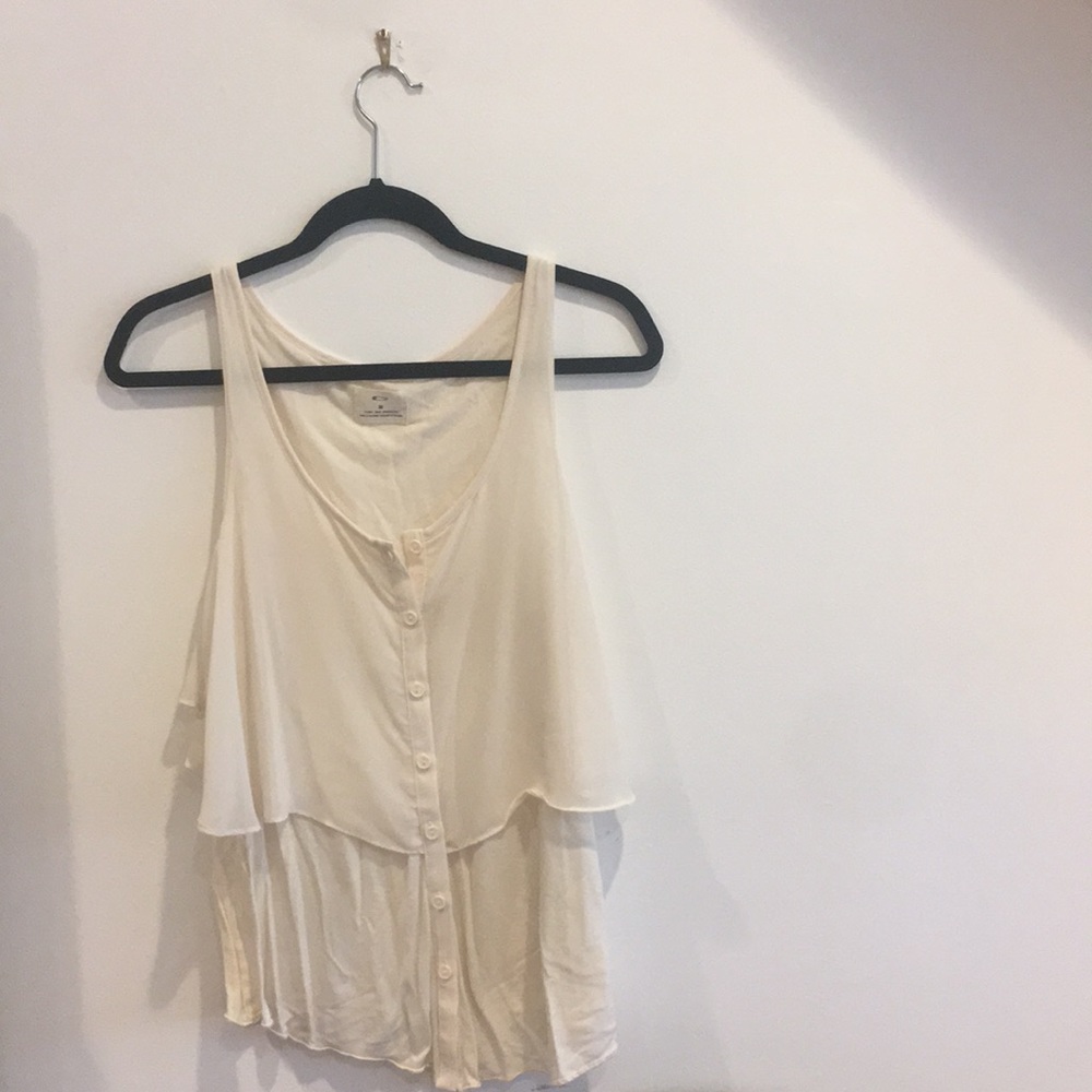 Cream colored top.
